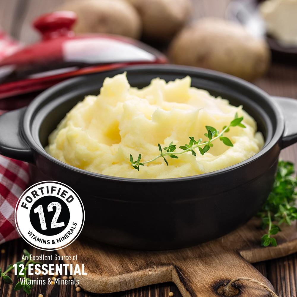 cherrywood mashed potatoes prepared in a black bowl