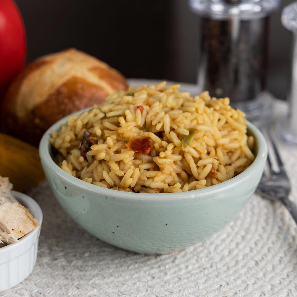 Savory rice dish with herbs in a bowl