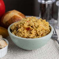 Thumbnail for Savory rice dish with herbs in a bowl