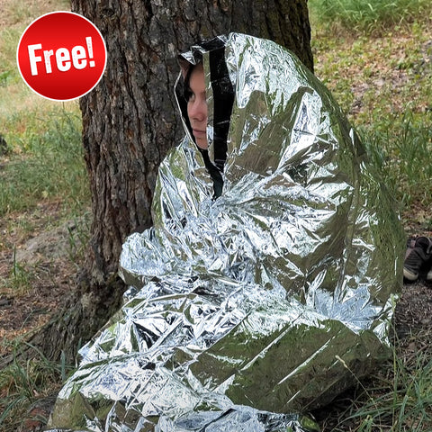 Image of Woman wrapped in emergency sleeping bag included in Independence Day Bundle